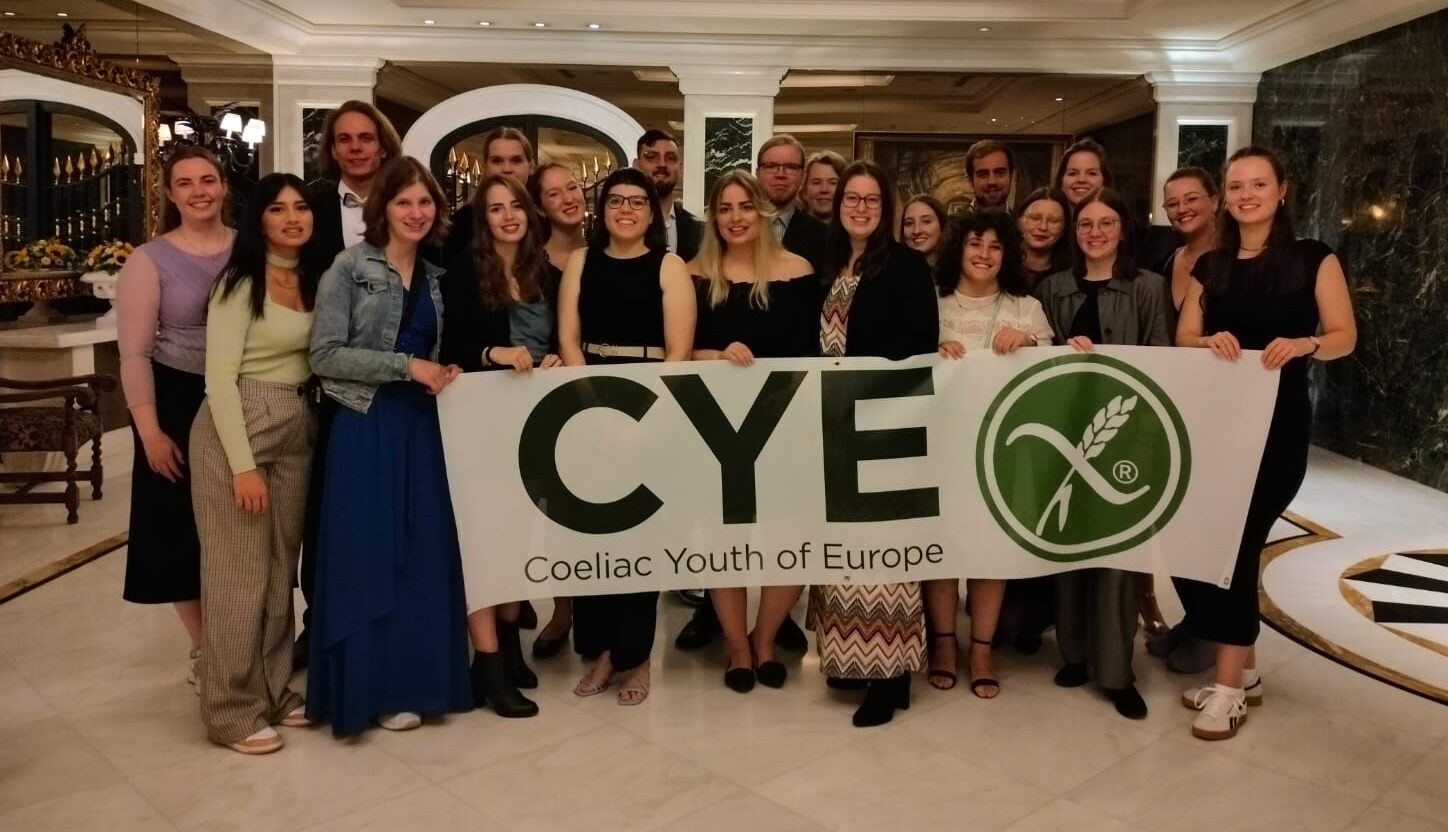 Group picture with all CYE delegates in the hotel lobby at the gala dinner.